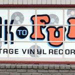 Outdoor sign for Monk to Funk Records